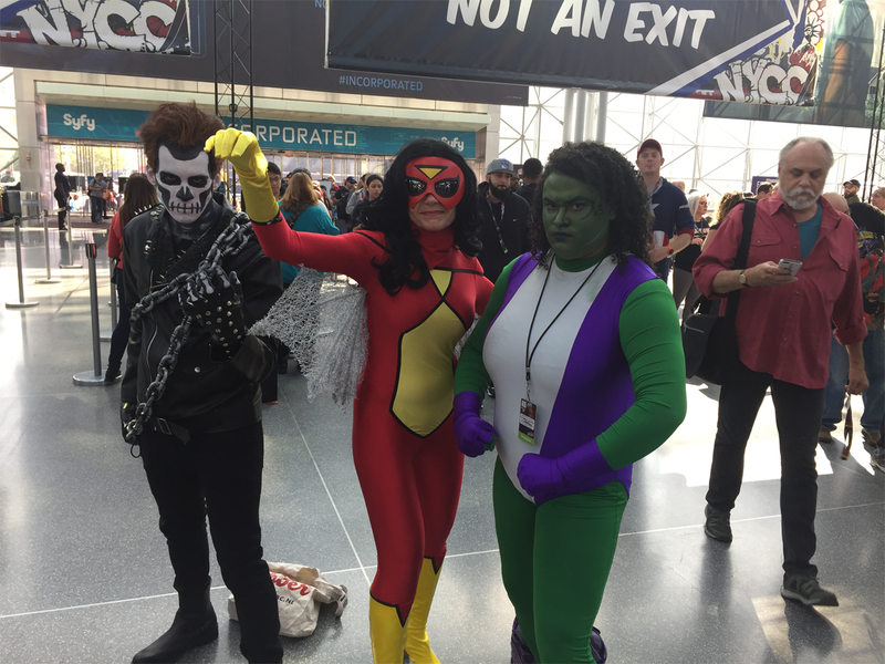 Ghost Rider, Spider-Woman, and She-Hulk show off those super-guns.